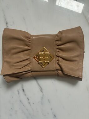 BCBGMaxAzria Nude Bow-Style Leather Clutch with Gold Logo Hardware